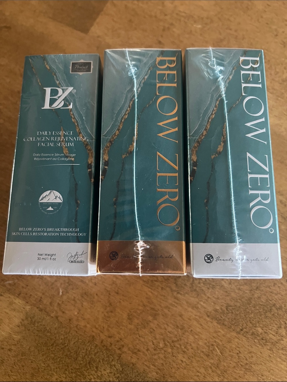 Daily Essence Collagen Rejuvenating Facial Serum – Teal and Gold